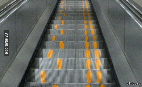 Clown Throwing Pie On Escalator