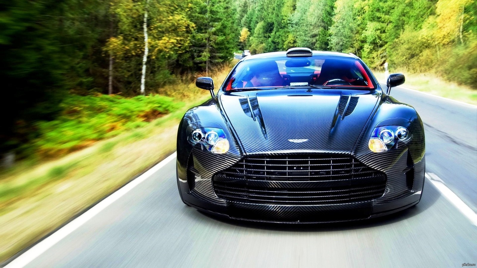 Машина по другому называется. Aston Martin Mansory. Aston Martin Carbon.